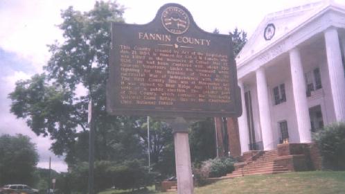 Sign Between Old and New Courthouses