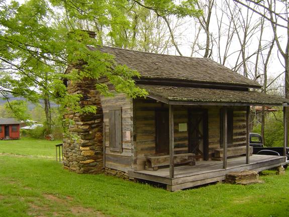 Log Cabin Hewn by John Payne